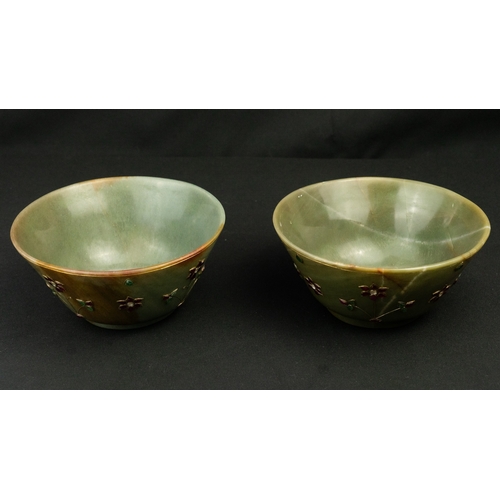 102 - A PAIR OF MUGHAL STYLE JADE CUPS, 20TH CENTURY
Of conical form, resting on small cylindrical base, c... 