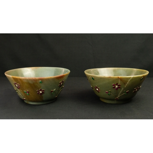 102 - A PAIR OF MUGHAL STYLE JADE CUPS, 20TH CENTURY
Of conical form, resting on small cylindrical base, c... 