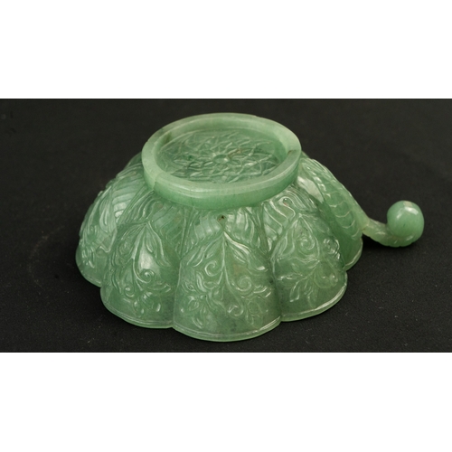 104 - A SMALL MUGHAL-STYLE GREEN JADEITE BOWL, AGRA, INDIA
Of polylobed flared form, resting on a short ci... 