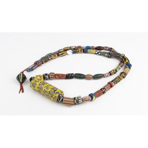 109 - A ROMAN STYLE MILLEFIORI NECKLACE
A beaded necklace formed of a variety of glass beads, featuring a ... 