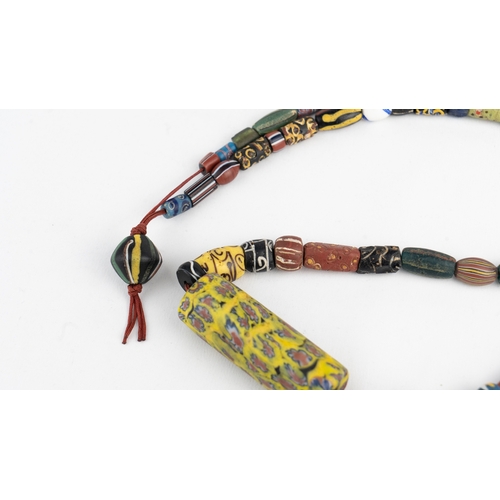 109 - A ROMAN STYLE MILLEFIORI NECKLACE
A beaded necklace formed of a variety of glass beads, featuring a ... 