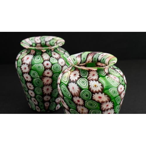 111 - A PAIR OF FRATELLI TOSO MURANO MILLEFIORI VASE
Of baluster form, resting on flat base, body tapering... 