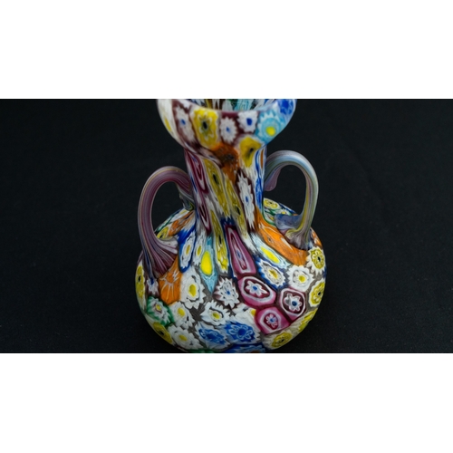 114 - A FRATELLI TOSO MURANO MILLEFIORI VASE
Of compressed bulbous shape, resting on a flat base, with a t... 