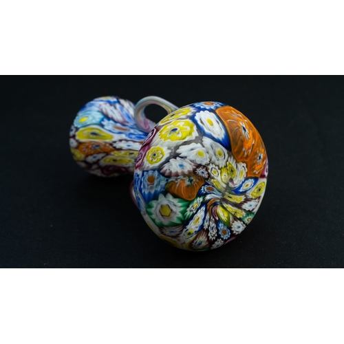 114 - A FRATELLI TOSO MURANO MILLEFIORI VASE
Of compressed bulbous shape, resting on a flat base, with a t... 