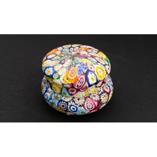 116 - A FRATELLI TOSO MURANO MILLEFIORI LIDDED BOX
Of cylindrical shape with a domed pull off lid, formed ... 