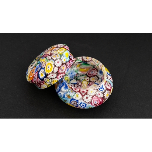 116 - A FRATELLI TOSO MURANO MILLEFIORI LIDDED BOX
Of cylindrical shape with a domed pull off lid, formed ... 