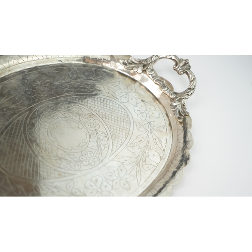 58 - AN OTTOMAN SILVER PLATE, TRAY  Of oval form with a scalloped cavetto, resting on a flat base, two ha... 