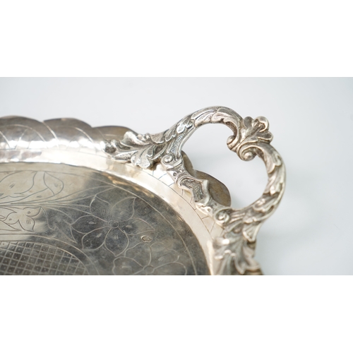 58 - AN OTTOMAN SILVER PLATE, TRAY  Of oval form with a scalloped cavetto, resting on a flat base, two ha... 