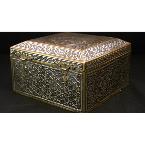 61 - A MAMLUK REVIVAL CAIROWARE SILVER INLAID BOX, POSSIBLY A QURAN BOX  Of square form with a hinged rai... 