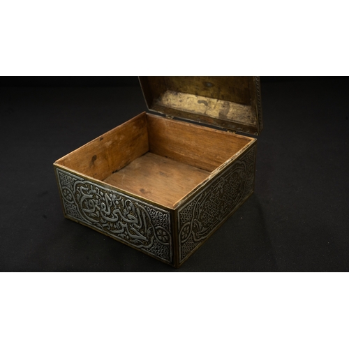 61 - A MAMLUK REVIVAL CAIROWARE SILVER INLAID BOX, POSSIBLY A QURAN BOX  Of square form with a hinged rai... 