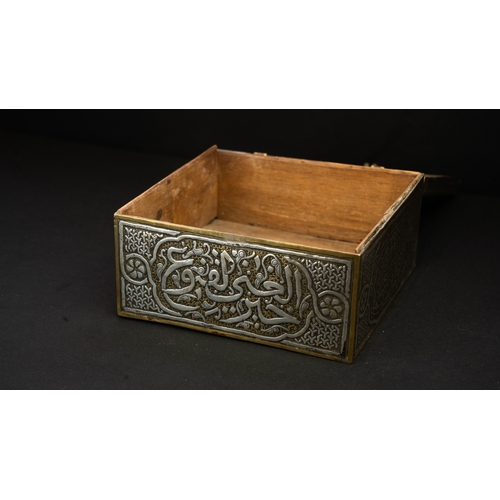 61 - A MAMLUK REVIVAL CAIROWARE SILVER INLAID BOX, POSSIBLY A QURAN BOX  Of square form with a hinged rai... 