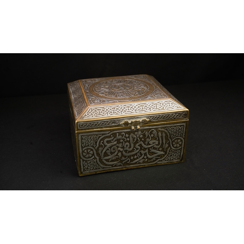 61 - A MAMLUK REVIVAL CAIROWARE SILVER INLAID BOX, POSSIBLY A QURAN BOX  Of square form with a hinged rai... 