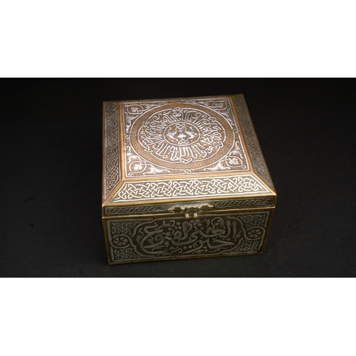 61 - A MAMLUK REVIVAL CAIROWARE SILVER INLAID BOX, POSSIBLY A QURAN BOX  Of square form with a hinged rai... 