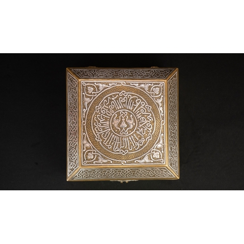 61 - A MAMLUK REVIVAL CAIROWARE SILVER INLAID BOX, POSSIBLY A QURAN BOX  Of square form with a hinged rai... 