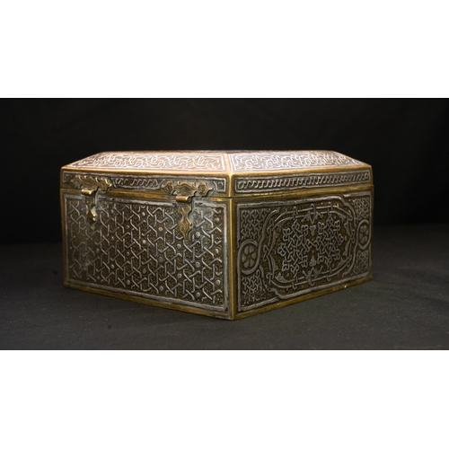 61 - A MAMLUK REVIVAL CAIROWARE SILVER INLAID BOX, POSSIBLY A QURAN BOX  Of square form with a hinged rai... 