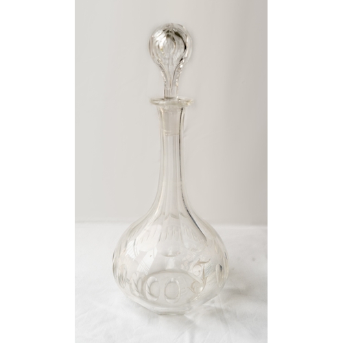 84 - A GLASS DECANTER
Of bulbous form, a glass decanter with cut oblong designs around the body, faceted ... 