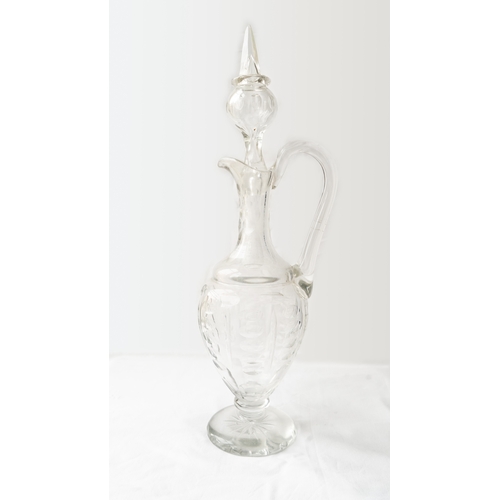 85 - A PAIR OF  VICTORIAN GLASS DECANTERS
Each of pear-shaped form, resting on a tapered circular foot, a... 