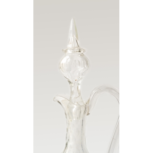 85 - A PAIR OF  VICTORIAN GLASS DECANTERS
Each of pear-shaped form, resting on a tapered circular foot, a... 