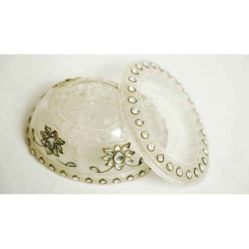 87 - AN INDIAN MUGHAL GEMSET ROCK CRYSTAL FLAT LIDDED OVAL BOWL
A gem-set crystal bowl, resting on flat b... 