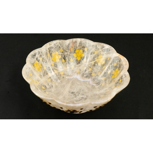 91 - AN INDIAN MUGHAL GEMSET ROCK CRYSTAL BOWL
A gem-set crystal lobed bowl, raised on short foot, embell... 