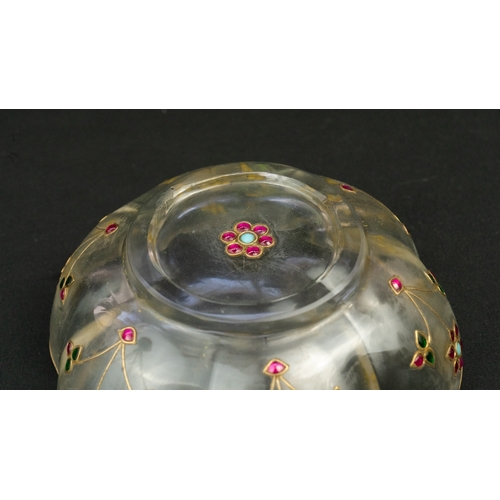 92 - A ROCK CRYSTAL LARGE BOWL, INDIA
A floriform rock crystal bowl, resting on a short circular foot, ea... 