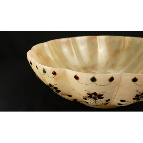 95 - A LARGE CARVED JASPERED AGATE BOWL, INDIA
Of polylobed form, resting on a short foot, carved in jasp... 