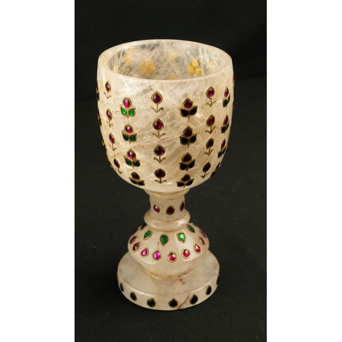 98 - A SET OF TWO MUGHAL STYLE ORNAMENTS,

ROCK CRYSTAL GOBLET, INDIA
Of traditional form, resting on a c... 