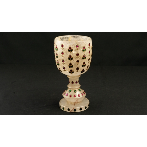 98 - A SET OF TWO MUGHAL STYLE ORNAMENTS,

ROCK CRYSTAL GOBLET, INDIA
Of traditional form, resting on a c... 