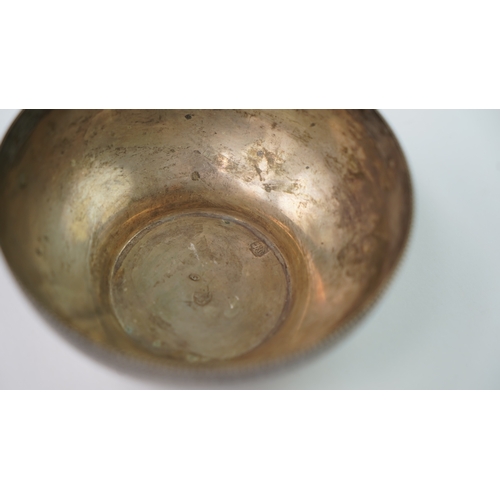 19 - A SILVER WATER CUP WITH A BIRD FINIAL Of inverted baluster circular form, resting on a flat base, S-... 