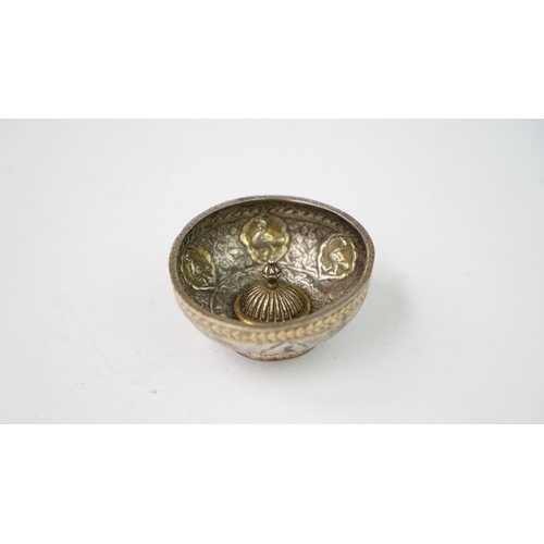 2 - A 
SMALL REPOUSSE OTTOMAN SILVER BOWL, Of rounded form with raised central roundel in the form of a ... 