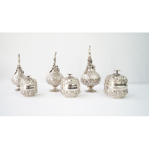 21 - A SET OF SIX SILVER  ORNAMENTS

THREE SILVER ROSE WATER SPRINKLER

Of globular form, rising to a nar... 