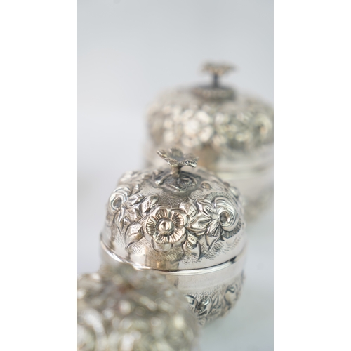 21 - A SET OF SIX SILVER  ORNAMENTS

THREE SILVER ROSE WATER SPRINKLER

Of globular form, rising to a nar... 