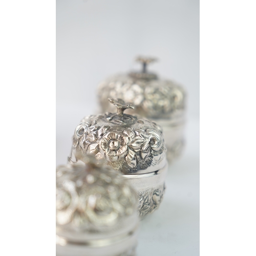 21 - A SET OF SIX SILVER  ORNAMENTS

THREE SILVER ROSE WATER SPRINKLER

Of globular form, rising to a nar... 