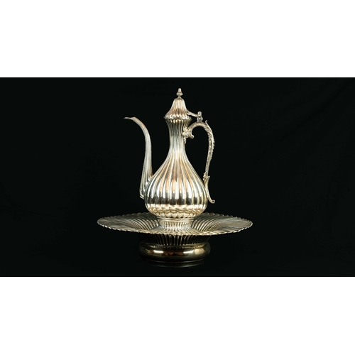 26 - THREE PIECE SILVER EWER WITH A BASIN SET, OTTOMAN, 19TH CENTURY Of pyriform shape, the fluted ewer w... 