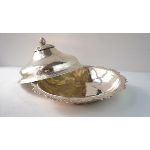 28 - AN OTTOMAN SILVER BOWL WITH A LID, SAHAN, OTTOMAN EMPIRE Of compressed rounded shape, resting on a s... 