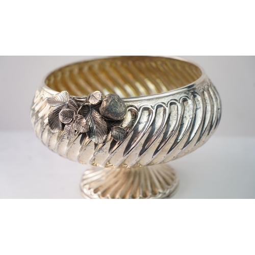 30 - A DECORATIVE SILVER BOWL, Of rounded form, resting on a splayed foot, with a slightly tapering rim, ... 