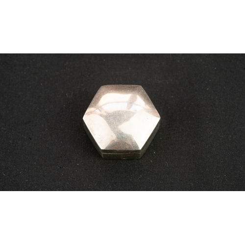 33 - A SILVER OCTAGONAL PILL BOX, Of octagonal form, with a pull-off lid, resting on a flat base, with a ... 