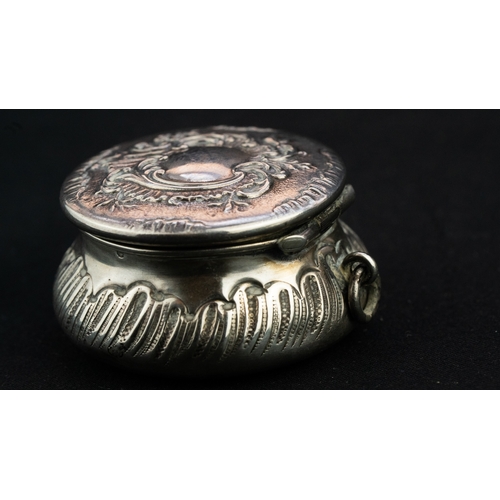 37 - A SILVER PENDANT TRINKET BOX 
A silver trinket box, serving as a pendant, of circular, bulbous form,... 