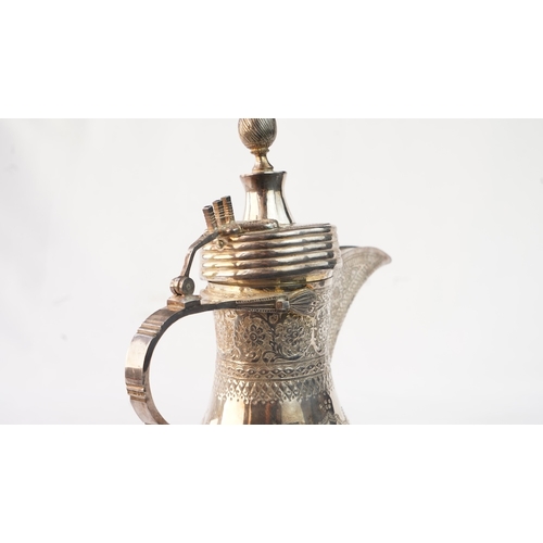 49 - A SILVER DALLAH COFFEE POT, PROBABLY EGYPT OR TUNISIA, EARLY 20TH CENTURY  Of typical form, with a b... 