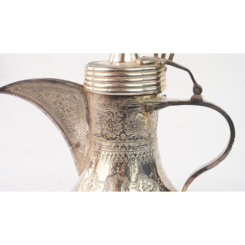 49 - A SILVER DALLAH COFFEE POT, PROBABLY EGYPT OR TUNISIA, EARLY 20TH CENTURY  Of typical form, with a b... 