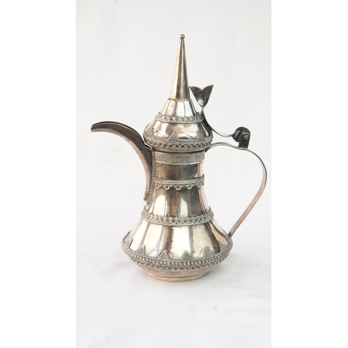 50 - A SILVER ARABIC COFFEE POT, MIDDLE EAST  Of traditional shape, a silver coffee pot with intricate de... 