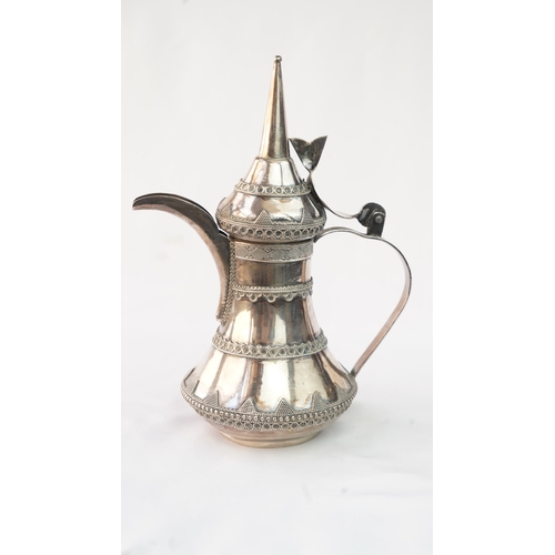 50 - A SILVER ARABIC COFFEE POT, MIDDLE EAST  Of traditional shape, a silver coffee pot with intricate de... 