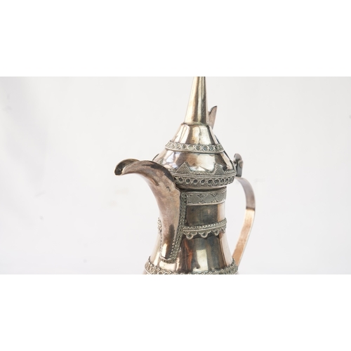 50 - A SILVER ARABIC COFFEE POT, MIDDLE EAST  Of traditional shape, a silver coffee pot with intricate de... 