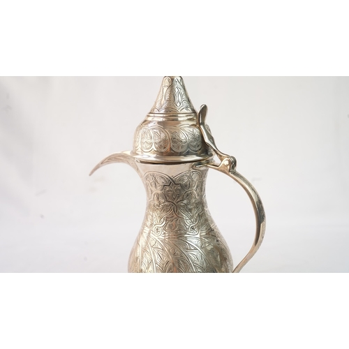 51 - AN EGYPTIAN SILVER COFFEE POT, EGYPT, 1947, MARKED  Fashioned in a baluster shape, the silver pot fe... 