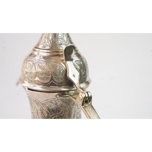 51 - AN EGYPTIAN SILVER COFFEE POT, EGYPT, 1947, MARKED  Fashioned in a baluster shape, the silver pot fe... 