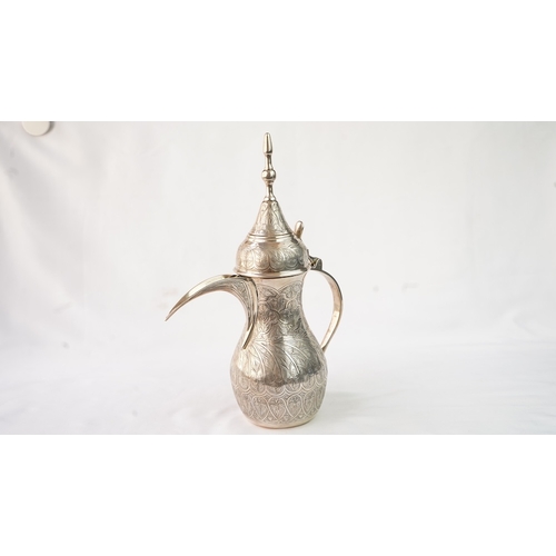 51 - AN EGYPTIAN SILVER COFFEE POT, EGYPT, 1947, MARKED  Fashioned in a baluster shape, the silver pot fe... 