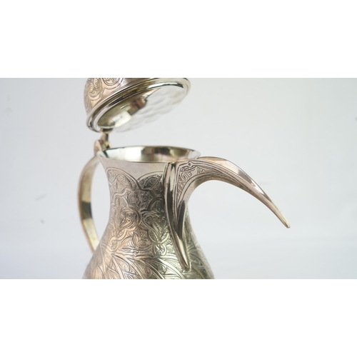 51 - AN EGYPTIAN SILVER COFFEE POT, EGYPT, 1947, MARKED  Fashioned in a baluster shape, the silver pot fe... 