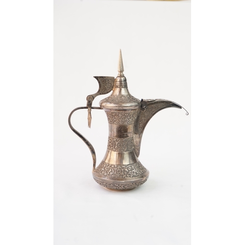 52 - A SILVER DALLAH COFFEE POT, MUSCAT, EARLY 20TH CENTURY. Of traditional shape, a silver coffee pot wi... 