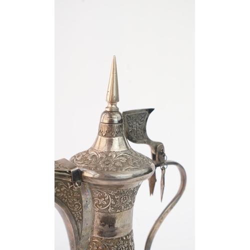 52 - A SILVER DALLAH COFFEE POT, MUSCAT, EARLY 20TH CENTURY. Of traditional shape, a silver coffee pot wi... 