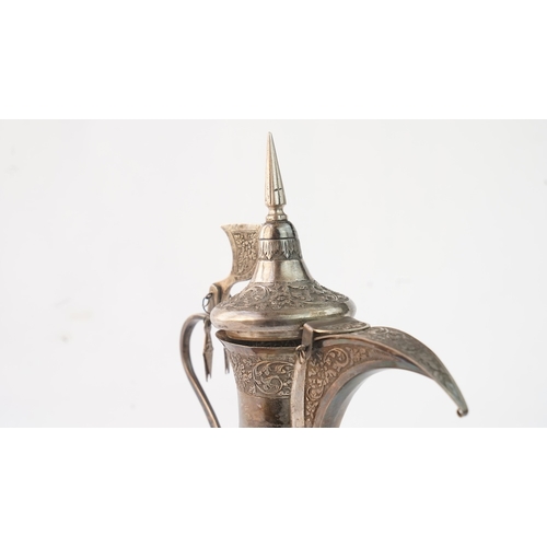 52 - A SILVER DALLAH COFFEE POT, MUSCAT, EARLY 20TH CENTURY. Of traditional shape, a silver coffee pot wi... 